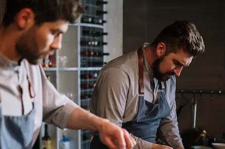 TIRAN Chef at work preparing gourmet steak